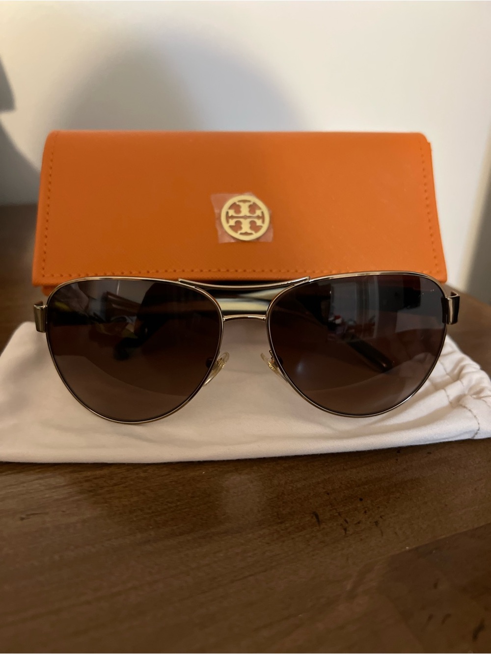 Tory Burch Polarized Aviator Sunglasses with Brown Lenses and Orange Case